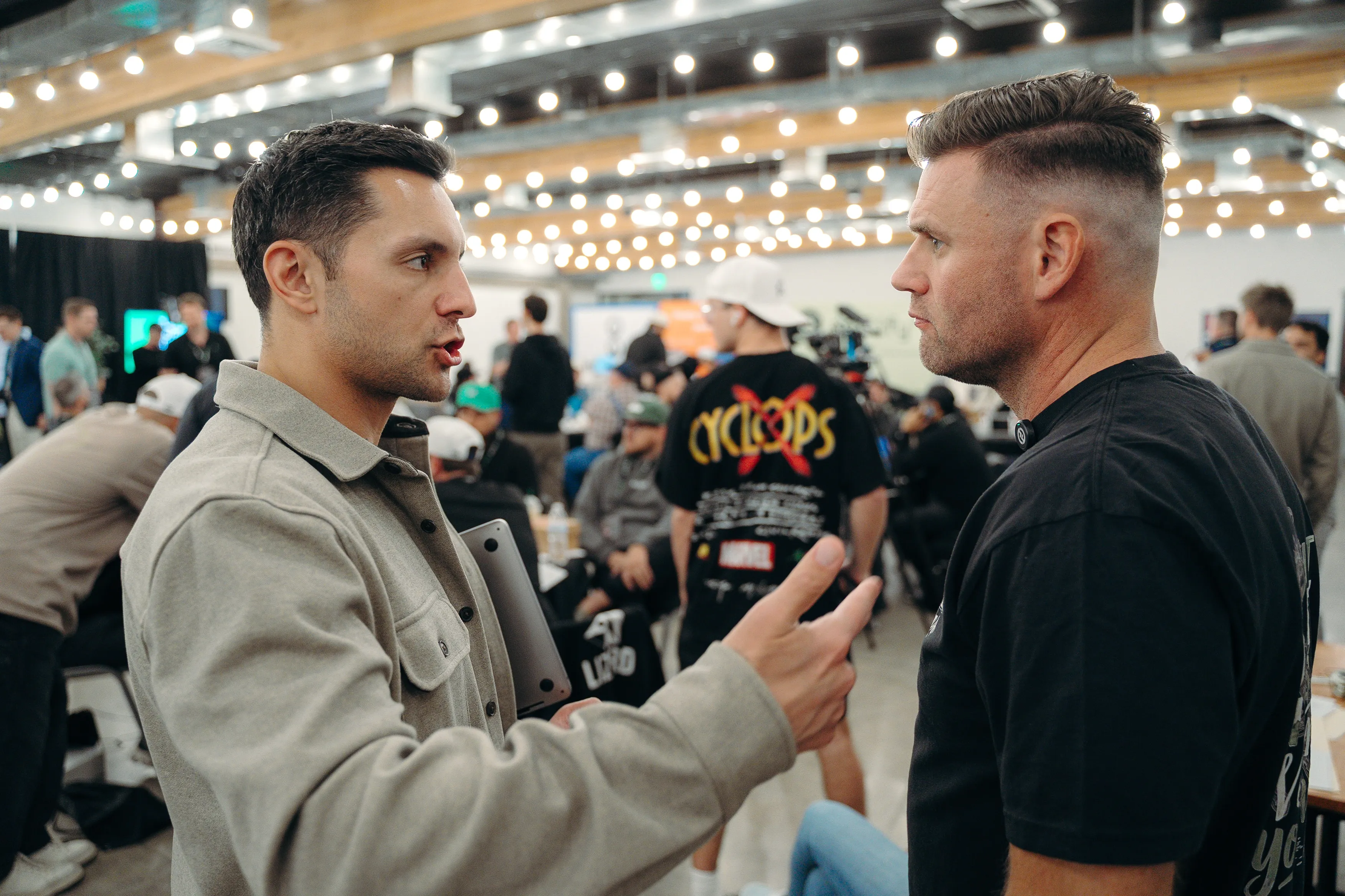 Two pest control owners talking at Bug Bux Con